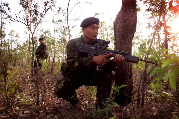 Framed Print : A British Gurkha patrol train in the Jungle of northern Australia September 1999