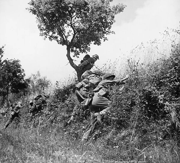 British infantry go into an attack in Italy. 11th July 1944