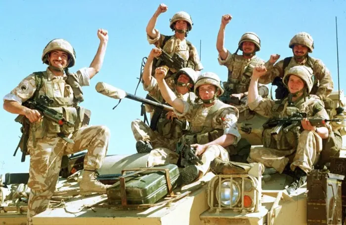 Framed Print : British infantrymen celebrate on a Warrior Armoured Personnel Carrier during the Gulf
