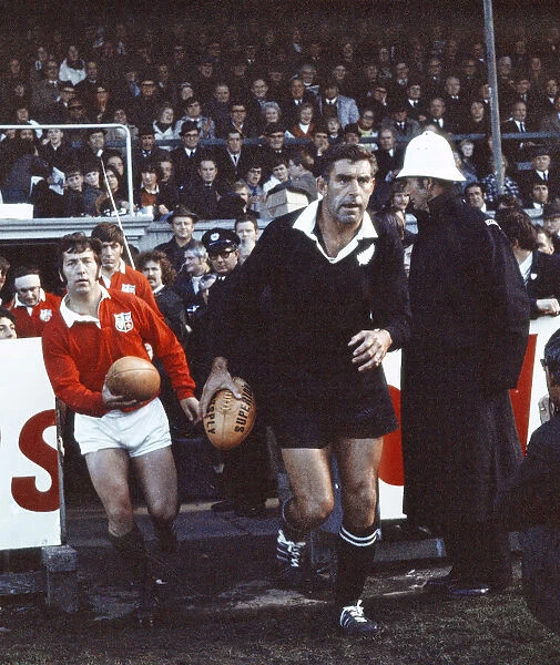 British Lions 9 v. New Zealand 3. John Dawes (l) and Colin Meads lead out their
