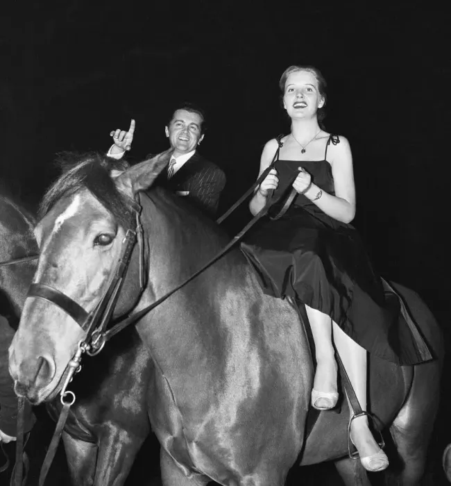 Framed Print : British musician Ronnie Ronalde and Bride Corsie on horseback Framed Print : British musician Ronnie Ronalde and Bride Corsie on horseback