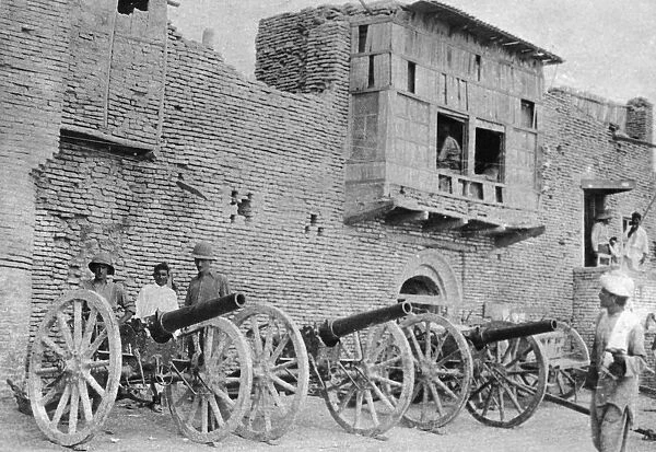 British officers inspect captured Turkish guns and material at Aziziya