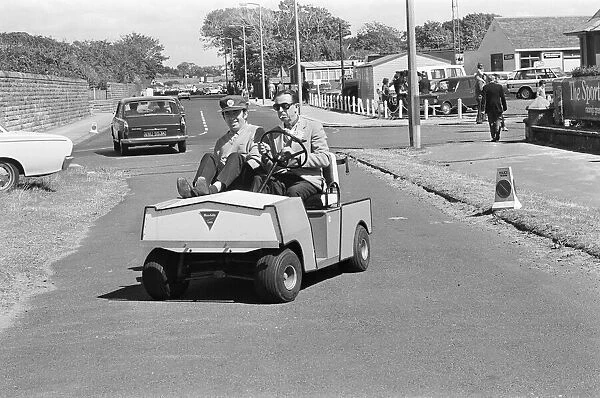 British Open 1973. Troon Golf Club in Troon, Scotland. Pictured, Golfer in buggy