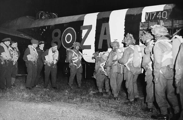 British paratroopers boarding a plane for France. 8th June 1944