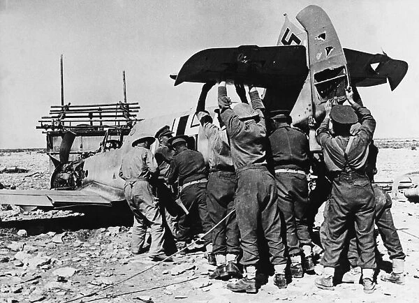 British patrol retrieves a crashed ME 109 in Libya during Second World War
