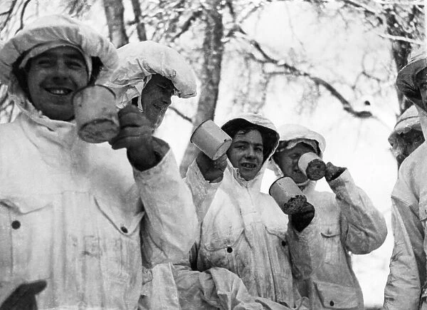 British patrol team dressed in white camouflage cloaks for their reconnaissance missions