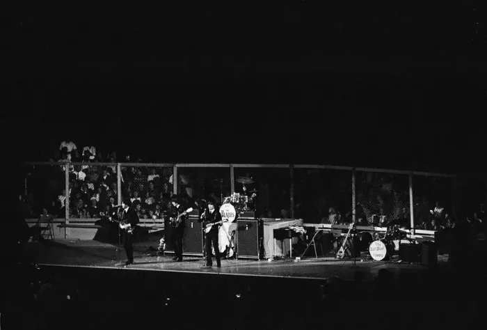 Framed Print : British pop group The Beatles performing on stage at the Cow Palace in San Francisco