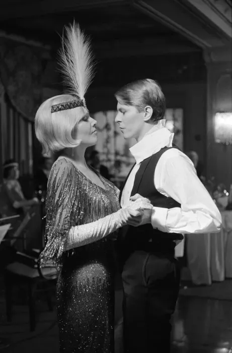 Framed Print : British pop singer David Bowie and actress Kim Novak pictured in a scene from their Framed Print : British pop singer David Bowie and actress Kim Novak pictured in a scene from their