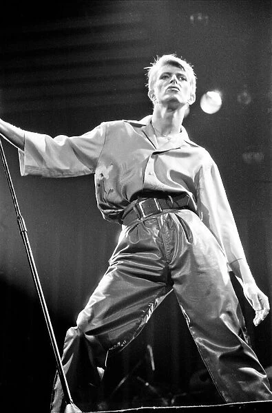 British pop singer David Bowie performing on stage during his concert at Earls court