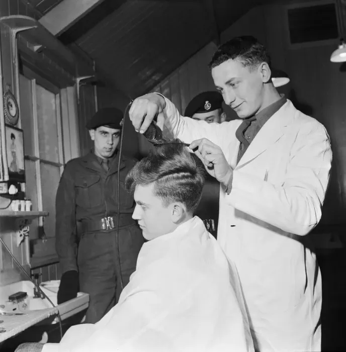 Framed Print : British pop singer Terry Dene gets a haircut from Rifleman G P Pennycook at Winchester Framed Print : British pop singer Terry Dene gets a haircut from Rifleman G P Pennycook at Winchester