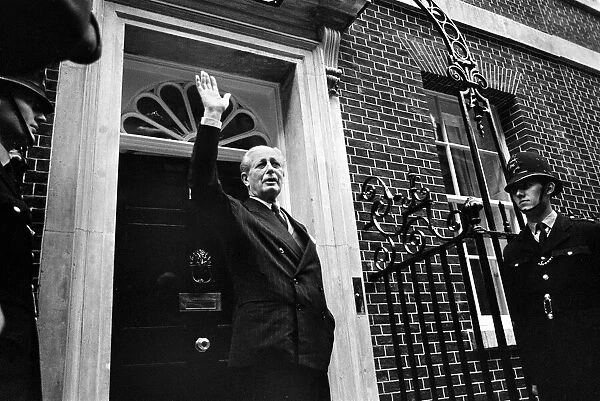 British Prime minister Harold MacMillan waves as he return to Number 10 Downing Street