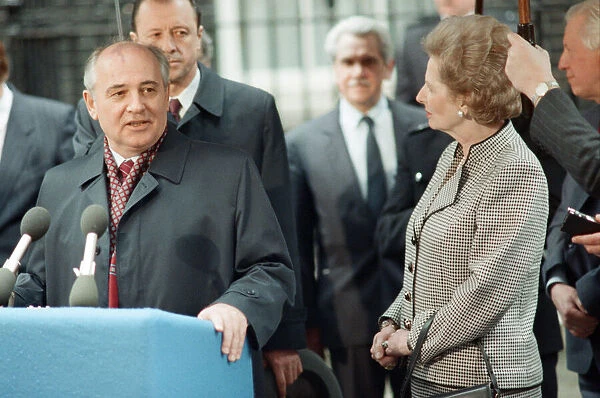 British Prime Minister Margaret Thatcher and others listens to Soviet Leader