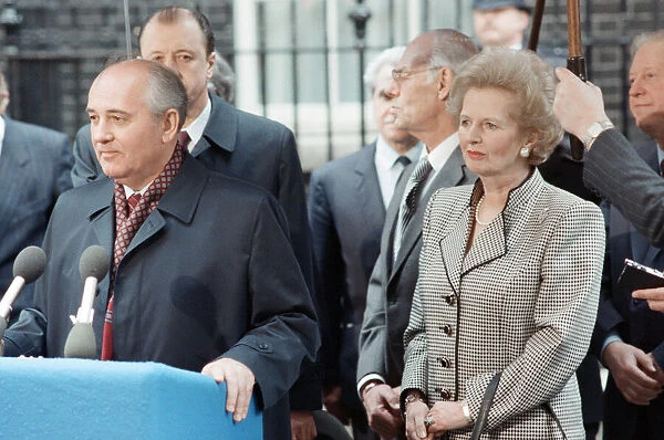 British Prime Minister Margaret Thatcher and others listens to Soviet Leader