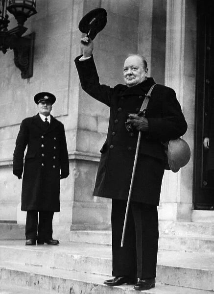 British Prime Minister Winston Churchill carrying his gas mask