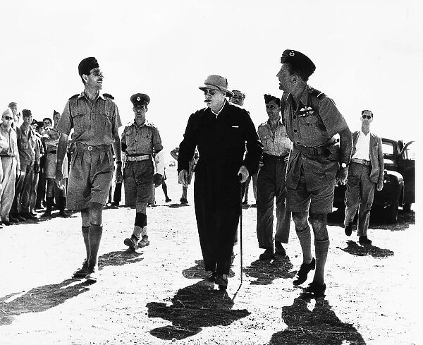 British Prime Minister Winston Churchill with General Sir Alan Cunningham inspecting an