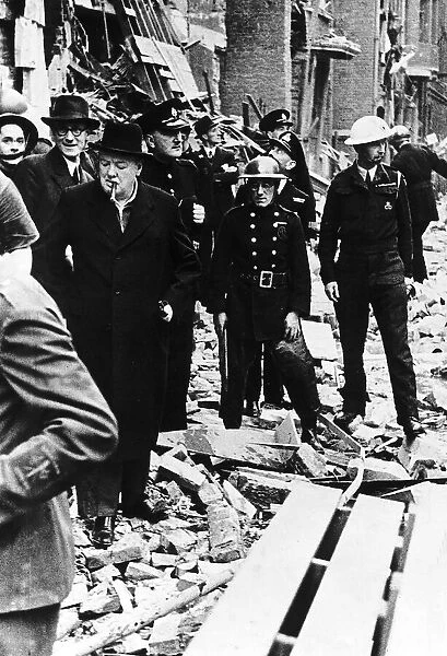 British Prime Minister Winston Churchill inspects the damage done by a flying bomb