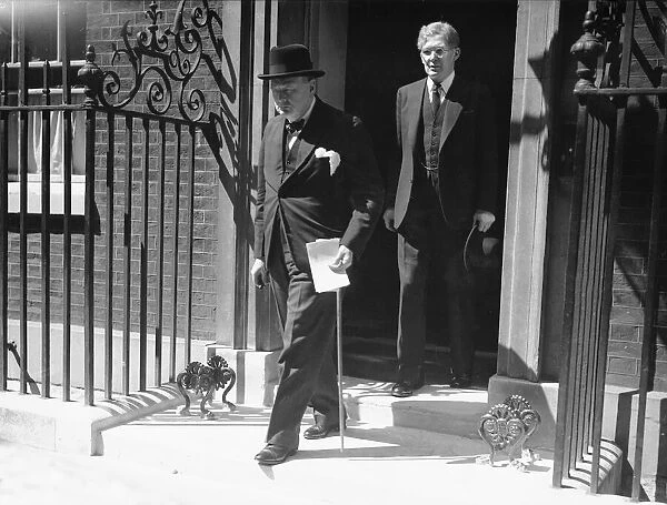 British Prime Minister Winston Churchill leaving Number 10 Downing Street to make a
