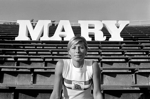 British runner Mary Rand poses during a photoshoot on the race track