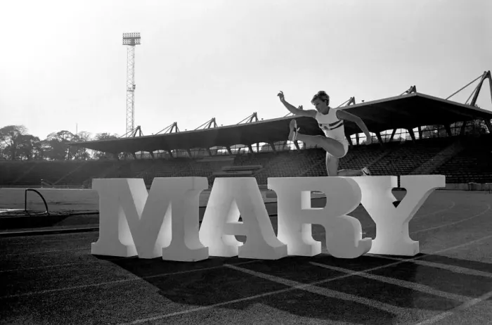 Framed Print : British runner Mary Rand poses during a photoshoot on the race track