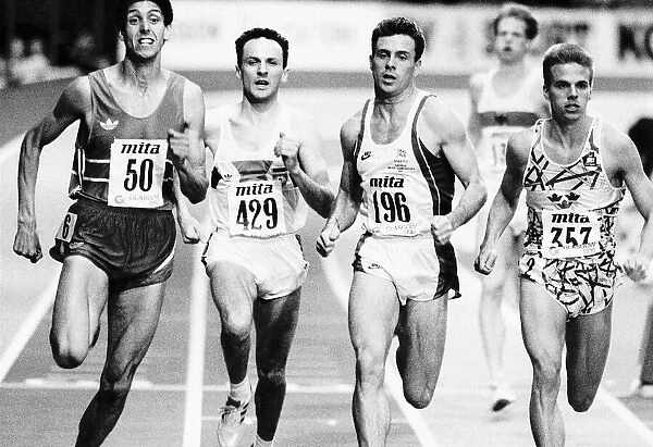 British runner Tom McKean on racetrack alongside competitors athletics. 25th July 1990