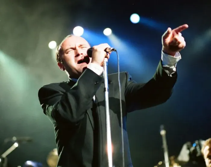 Framed Print : British singer Phil Collins performing on stage during a concert in Britain Framed Print : British singer Phil Collins performing on stage during a concert in Britain