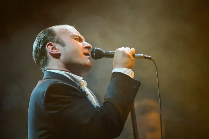 Framed Print : British singer Phil Collins performing on stage during a concert in Britain Framed Print : British singer Phil Collins performing on stage during a concert in Britain