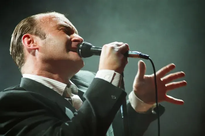 Framed Print : British singer Phil Collins performing on stage during a concert in Britain Framed Print : British singer Phil Collins performing on stage during a concert in Britain