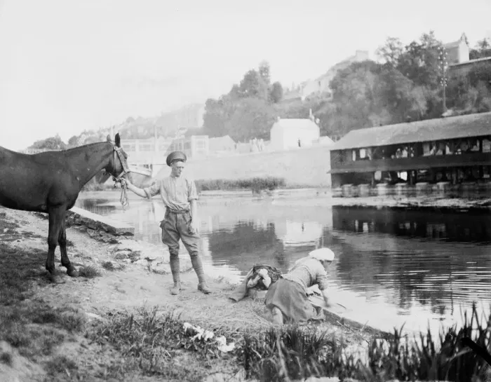 Framed Print : A British soldier seen here with his horse on the banks of an un-named French river Framed Print : A British soldier seen here with his horse on the banks of an un-named French river