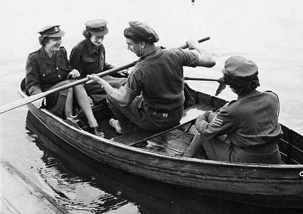 British soldier takes A. T. S. women rowing in Hamburg on the Alster inland lake