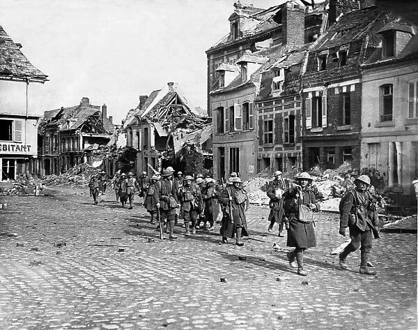 British soldiers march into Peronne after its capture 1917 during World War One