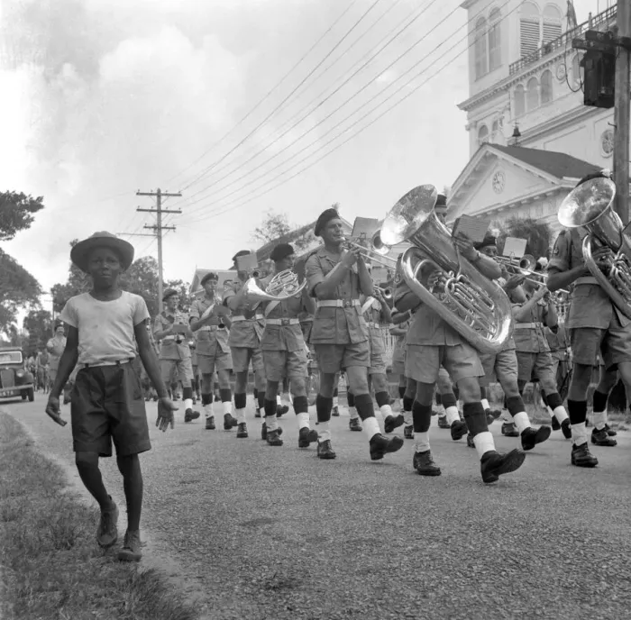 Framed Print : British soldiers marching in Georgetown, British Guiana watched by local citizens