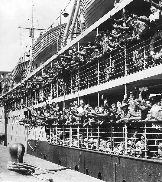British soldiers waving as troop ship sets sail for France during WW2 1940