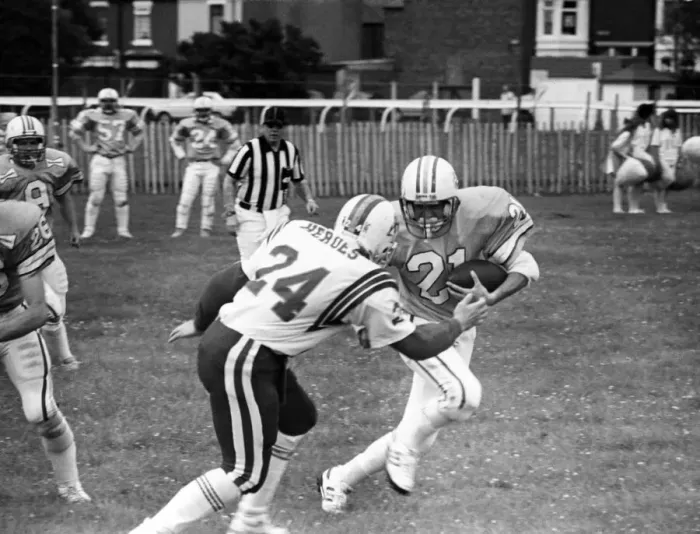 Framed Print : British Steel Gala - A member of the Scunthorpe Steelers tries to dodge a tackle by an Framed Print : British Steel Gala - A member of the Scunthorpe Steelers tries to dodge a tackle by an