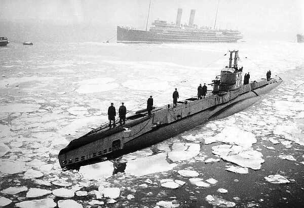 A British submarine noses its way through ice covered waters off the East Coast of