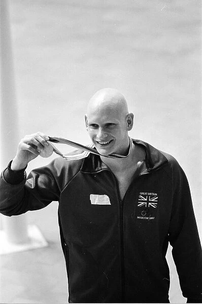 British swimmer Duncan Goodhew celebrates after receiving olympic gold medal in