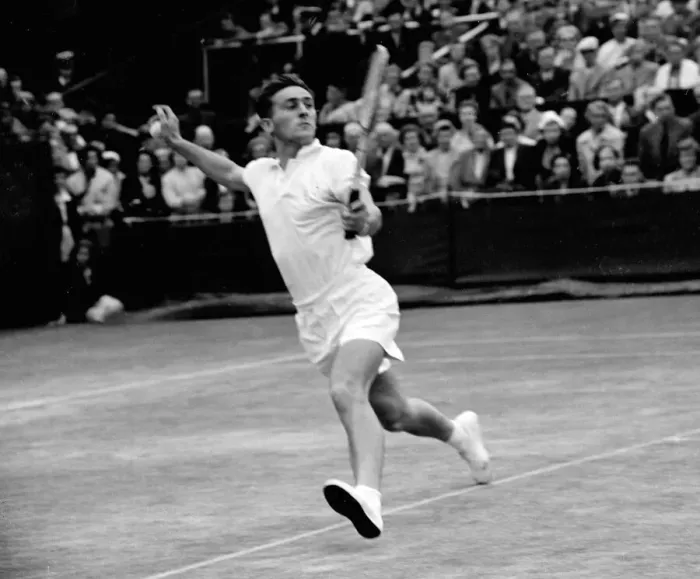 Framed Print : British tennis player John Barrett in action against Ken Rosewall of Australia during