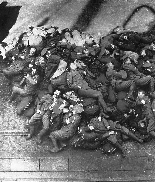 British troops asleep on Boulogne Quay, having just arrived to join their French