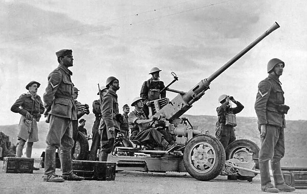 British troops at Crete. a gun on the look out for Italian raiders. December 4th 1940