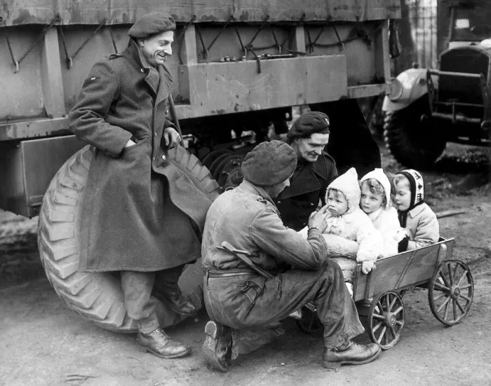 Framed Print : British troops with German children following the invasion of Germany in February 1945