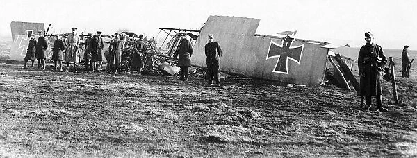 British troops guard the wreckage of a German Gotha bomber of Bogohl 3 after it was