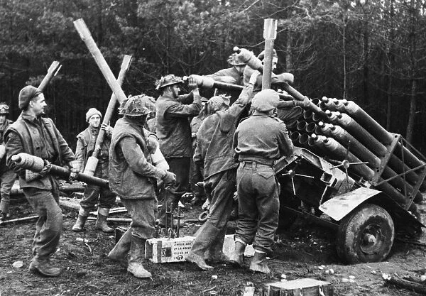 British troops loading rocket artillery in the Reichswald area in Germany