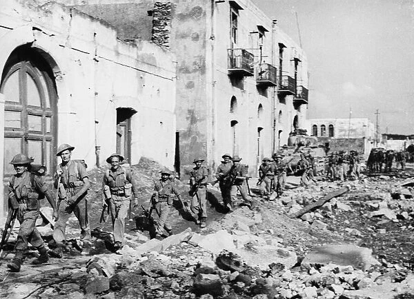 British troops marching into Torre Annunziata. 16th October 1943