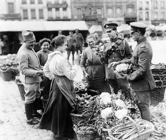 Framed Print : British troops shopping in a French vegetable market during the final year of World War Framed Print : British troops shopping in a French vegetable market during the final year of World War