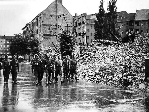 British troops survey the bomb damage to the famous Wilhelmstrasse