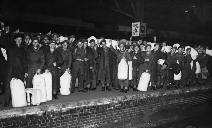 Framed Print : British troops give the thumbs up as they return home following their release