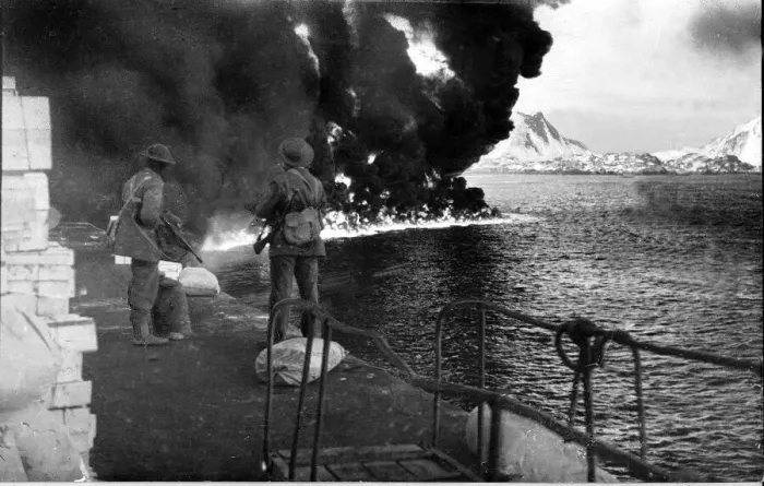 Framed Print : British troops watch Oil burning on the surface of the sea at Stamsund Framed Print : British troops watch Oil burning on the surface of the sea at Stamsund