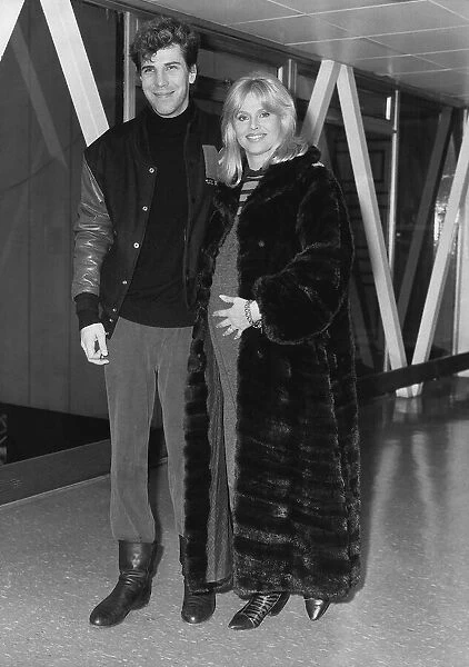 Britt Ekland Actress with husband Slim Jim McDonell leaving Heathrow for Los Angeles 8