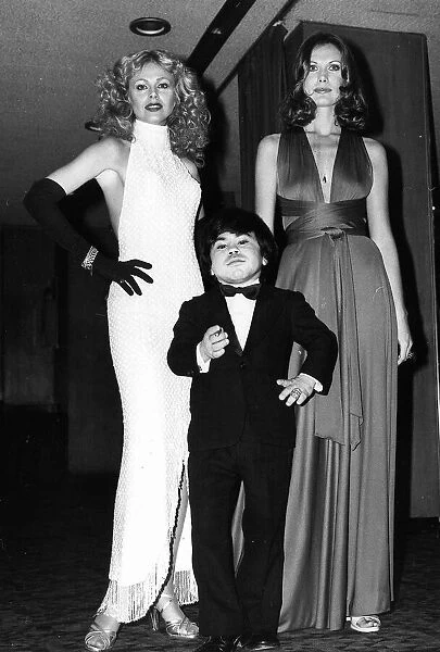 Britt Ekland actress with Maud Adams and Herve Villechaize at premiere of