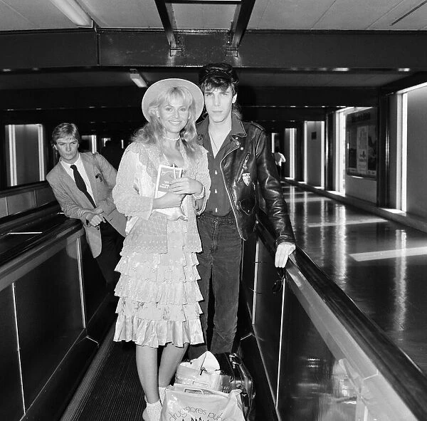 Britt Ekland with boyfriend Jim McDonnell, leaving Heathrow for Los Angeles