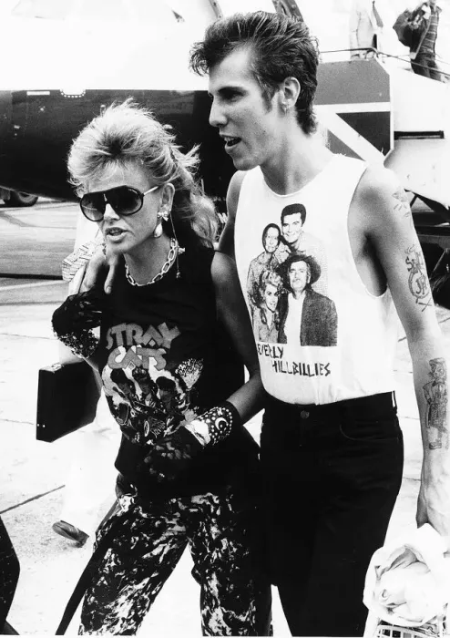 Framed Print : Britt Ekland with her boyfriend Slim Jim McDonnell pictured here at Heathrow Airport Framed Print : Britt Ekland with her boyfriend Slim Jim McDonnell pictured here at Heathrow Airport
